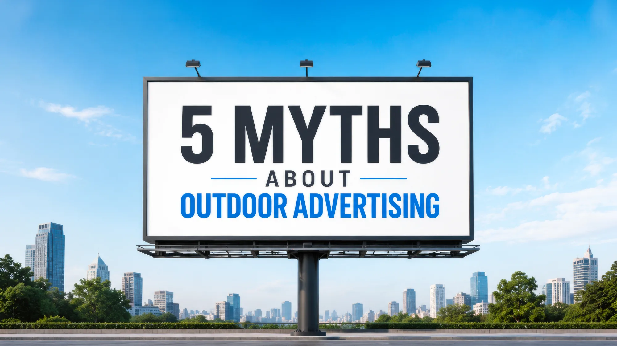 A billboard against a city skyline reading “5 Myths About Outdoor Advertising”